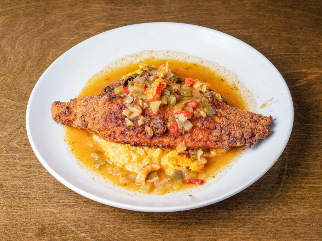 Dejavoo Special · Fried catfish topped with crawfish etouffee and pimento cheese grits.