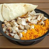 Natural Chop · Chopped grilled chicken breast with our special yellow rice and pita. Served with your choic...