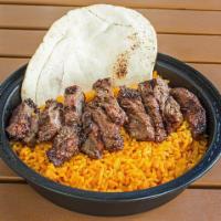 Natural Churrasco · Chopped specially marinated steak, lettuce, tomato and pita. Served with choice of rice and ...