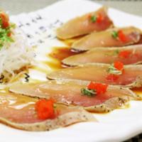 Albacore Truffle · Truffle oil with butter ponzu sauce.
