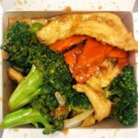Broccoli Chicken · Sliced white meat chicken with broccoli, carrot and onions stir fried in brown sauce. 
