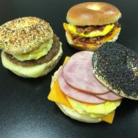 Egg-Ala-Bagel · Our signature Breakfast Scrambled Egg Sandwich on your choice of Bagel with your choice of m...