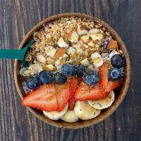Power Bowl · Blended peanut butter, acai, blueberries, banana, pineapple, and almond milk. Topped with gr...