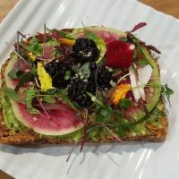 Rainbow Avocado Toast · Seedful toast, seasoned avocado, watermelon radish, microgreens, blackberries, and hemp seeds.
