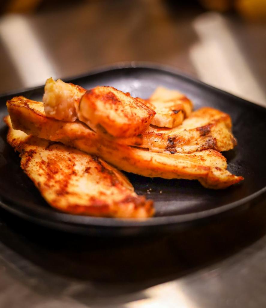 Kid's Grilled Chicken Strips · 4 strips of our grilled chicken breast with a choice of dipping sauce.