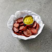 Grilled Smoked Kielbasa Bites · Served with homemade hot mustard.