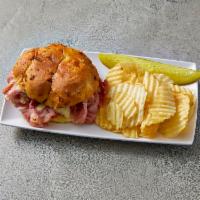 Stacked Ham and Swiss Deluxe · 1/2 lb. fresh sliced ham and Swiss cheese on grilled onion roll. Includes fries and slaw..