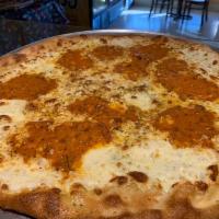 Vodka Sauce Pizza  · With fresh mozzarella and finely shredded basil.