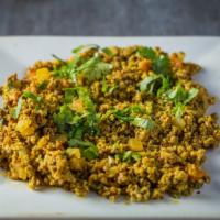 Paneer Bhurji · Scrambled paneer with veggies and masala.