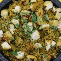 Chicken Pulav · Veggie rice with chicken.