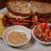 Pastrami Reuben Sandwich · swiss cheese, russian dressing, cole slaw, pickle, on rye bread