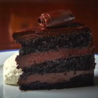 Allen Grubman's Chocolate Blackout Cake · triple-layered valrhona chocolate cake & chocolate ganache frosting