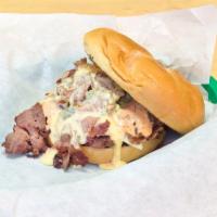 Alan Burger · Our traditional handmade 1/2 burger, topped with a mountain of our famous philly cheesesteak...