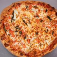 Margherita Pizza · Tomato, basil and garlic.