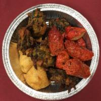 Delhi 6 Platter · Samosa, vegetable pakora, chicken tikka and lamb seekh kabob.