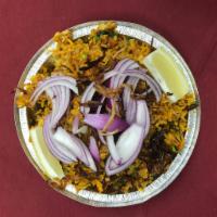 Veggie Biryani · Aromatic basmati rice with saffron, nuts and raisin.