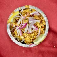 Lamb Biryani · Aromatic basmati rice with saffron, nuts and raisin.