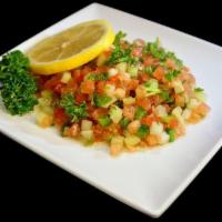 Shirazi Salad · Cucumber, tomato, onion, parsley, lemon juice and olive oil. 