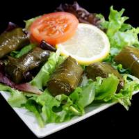 Dolmeh · Five pieces of stuffed grape leaves with rice, oil, onion and savory spices. 