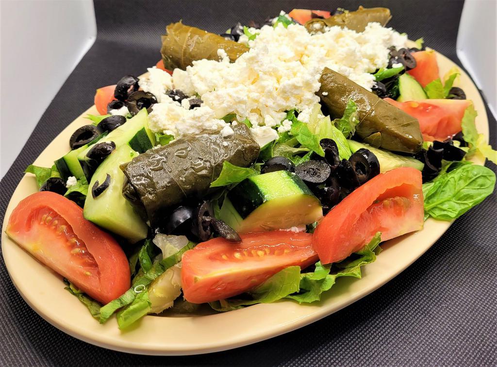 Original Flame Feta Salad · Includes four dolmeh and crumbled feta cheese.