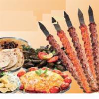 Kubideh Party Platter for 100 · All ground meat (beef, lamb, and chicken). Includes rice, bread, mixed greens, grilled tomat...