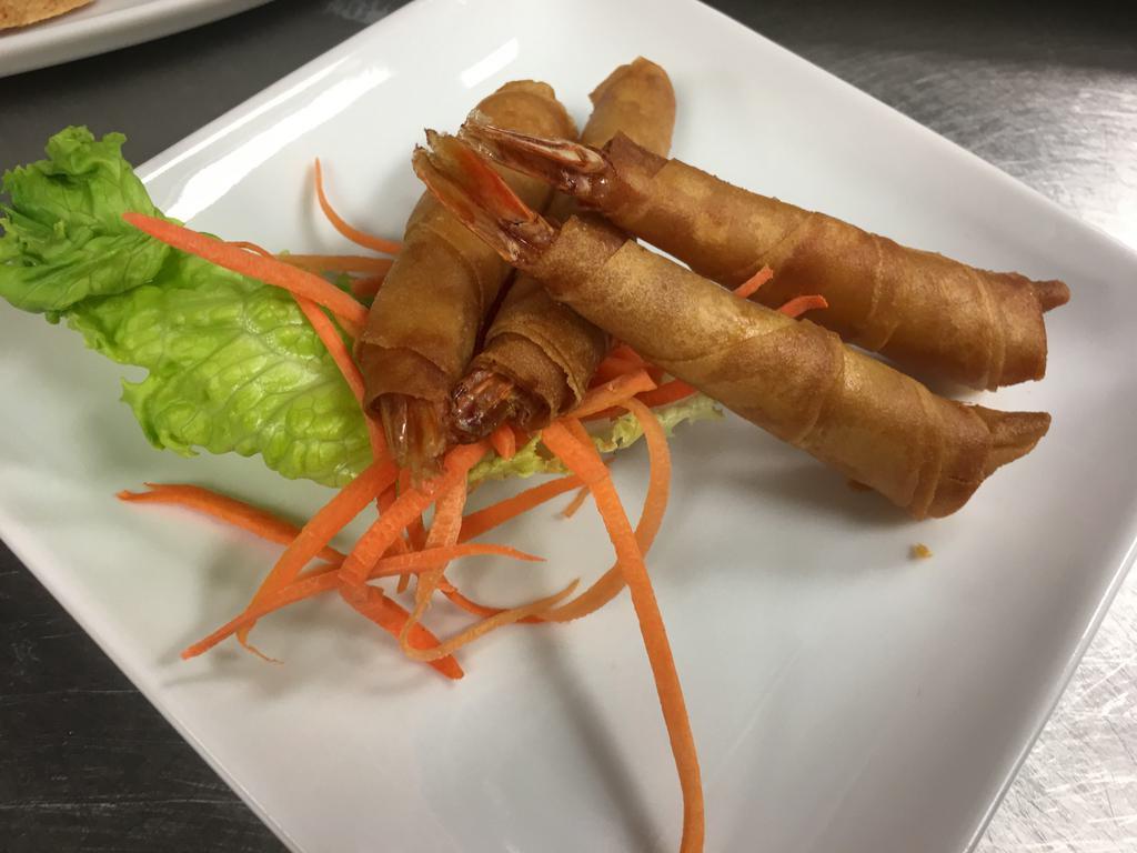 Fried Shrimp · Shrimp in a blanket. Wrapped with spring roll shells, served with sweet chili sauce.