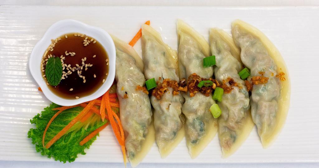 Dumpling · Fried or steamed. Served with soy sauce.