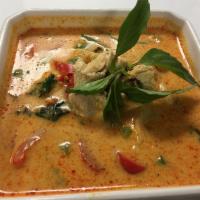 Red Curry · Bamboo shoot, red and green bell peppers, coconut milk, basil with red curry paste.