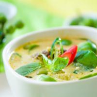 Green Curry · Eggplant, red and green bell peppers, coconut milk, basil with green curry paste.