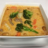 Massaman Curry · Potato, broccoli, carrots, onion peanut, coconut milk with massaman curry paste.
