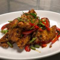 Spicy Fish · Fish, red bell pepper, kra chai, green bean and lime leaf.