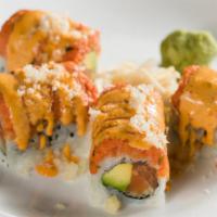 Fashion Roll · Salmon avocado and cucumber inside, topped with spicy tuna and crunch.