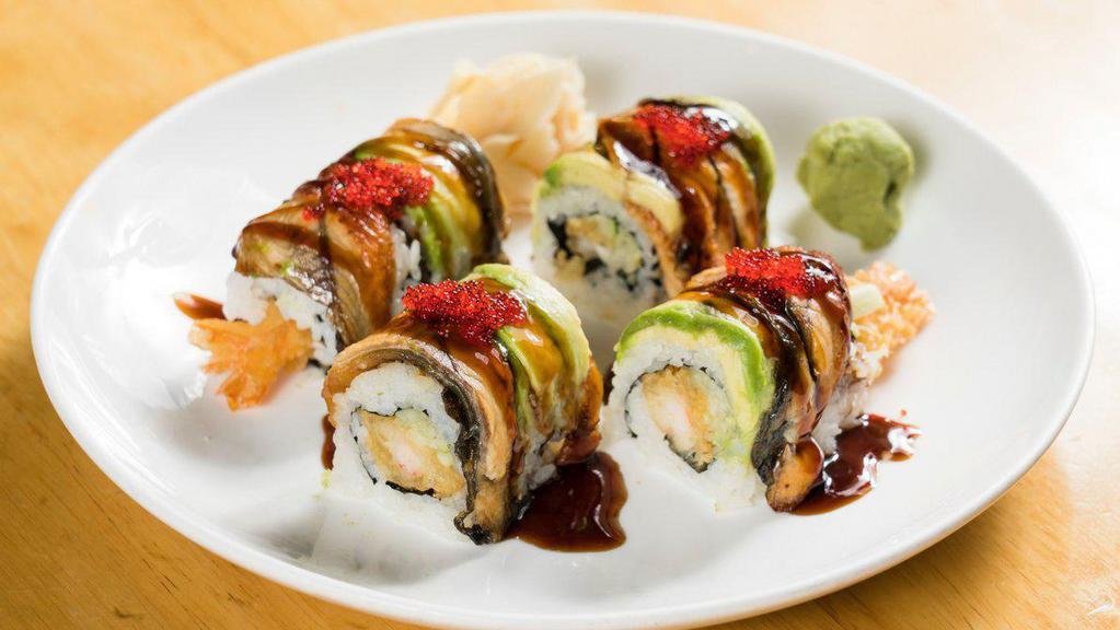 Double Dragon Roll · Shrimp tempura and cucumber inside, topped with eel, avocado and tobiko.