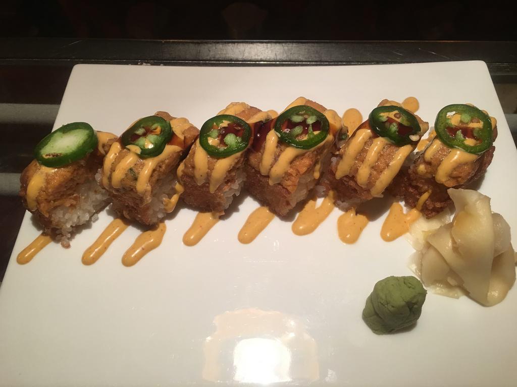 Crispy Spicy Tuna Roll · Lightly fried sushi rice, topped with spicy tuna, jalapeno, spicy aioli and eel sauce.