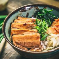 Buta Kimchi Don · Braised pork belly with kimchi over rice.