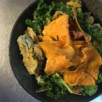 Kale Salad · Crispy sweet potato, raisin and miso dressing.