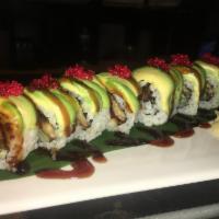 Dragon Roll · Eel roll wrapped with avocado and tobiko.
