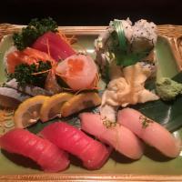 Sushi Sashimi Combination · 2 bigeye tuna, 2 yellowtail and California rolls and 2 bigeye tuna, 2 white fish, 2 salmon a...