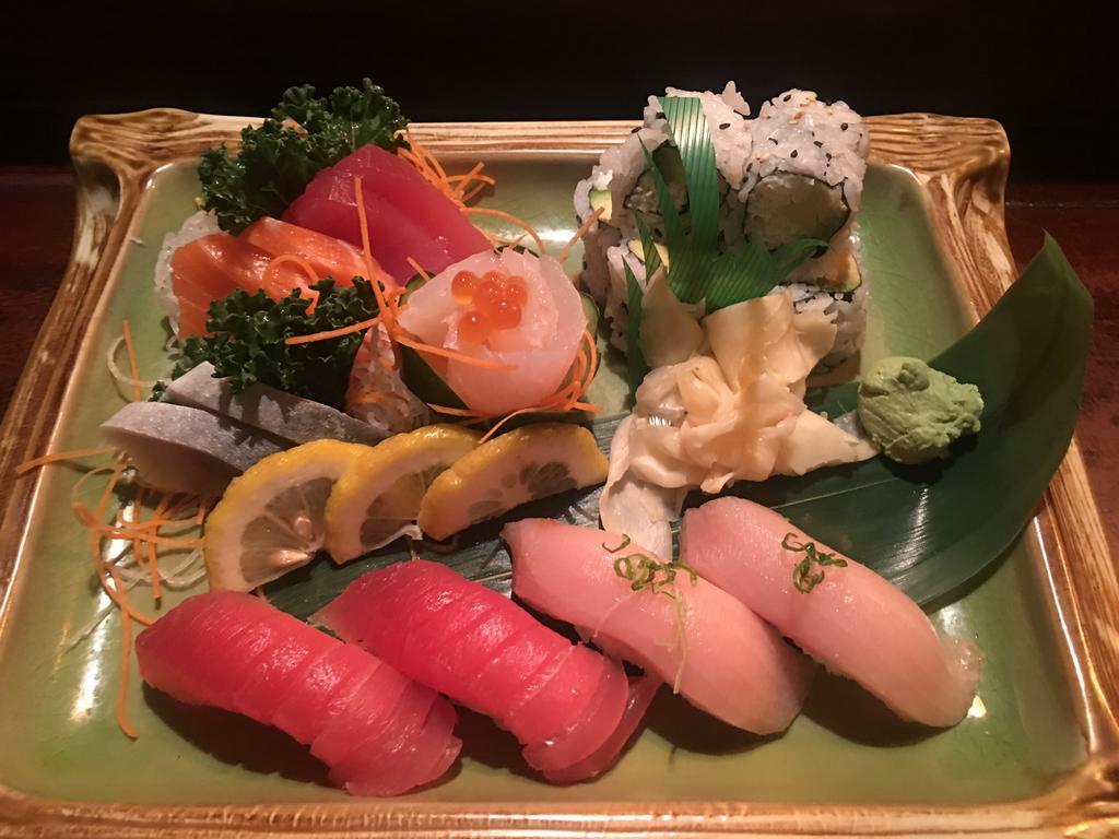 Sushi Sashimi Combination · 2 bigeye tuna, 2 yellowtail and California rolls and 2 bigeye tuna, 2 white fish, 2 salmon and 2 mackerel sashimi. Served with sushi rice.