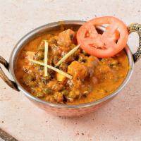Mutter Paneer · Cottage cheese cubes and green peas cooked in a mildly spiced sauce with dash of cream.