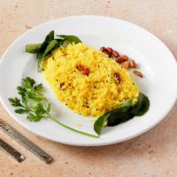 Lemon Rice(V) · Basmati rice spiced with mustard seeds, curry leaves, peanuts and lemon juice.