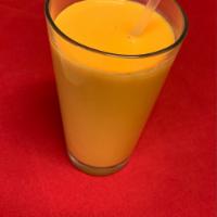 Mango Lassi · Yogurt-based drink blended with mango, sugar and spices.