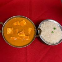 Tofu Tikka Masala · cooked in creamy butter sauce with Himalayan herbs & spices.