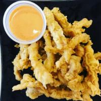 Calamari · Crispy deep fried calamari. Comes with creamy spicy sauce.