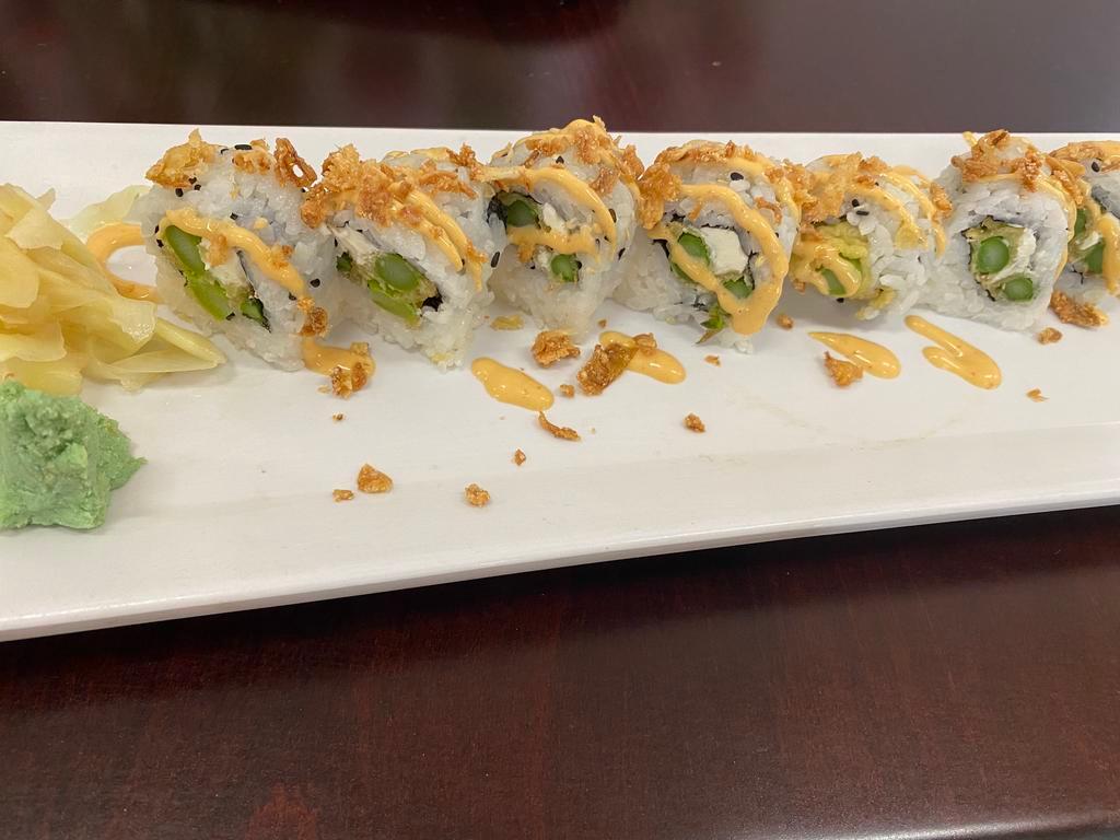 Asparagus Roll · (8 pcs)Tempura asparagus, cream cheese, spicy mayo sauce with crunchy onions bits on top of the roll.