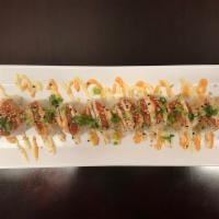 Hawaiian Roll · In tempura shrimp, spicy imitation crab, avocado, cucumber, top spicy tuna with sauce, sesam...