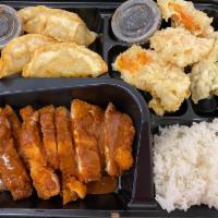 Katsu Chicken Bento Box · Katsu chicken, Served with steamed rice, vegetable tempura, 3 pcs chicken gyoza.
