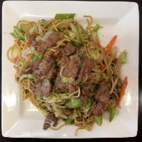 Beef Yakisoba · Stir fried yakisoba noodles. Served with green cabbage, sliced carrots, onion and celery.