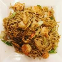 Kura Yakisoba · Shrimp and chicken with stir fried yakisoba noodles. Served with green cabbage, sliced carro...