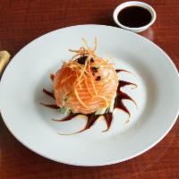 Salmon Avocado Salad · Crabmeat, avocado and cucumber mixed with spicy mayo, wrapped in thinly sliced fresh salmon ...